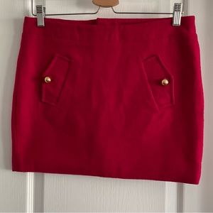 TOMMY HILFIGER mini skirt with golden buttons in fuchsia colour, thick fabric